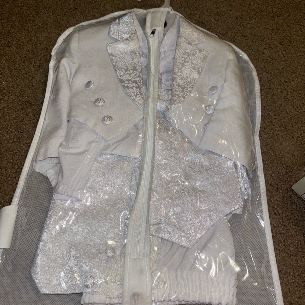 Like new baby boy all white christening tux size Medium. Worn once.